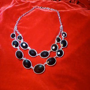 Silver in color and black, double strand, necklace